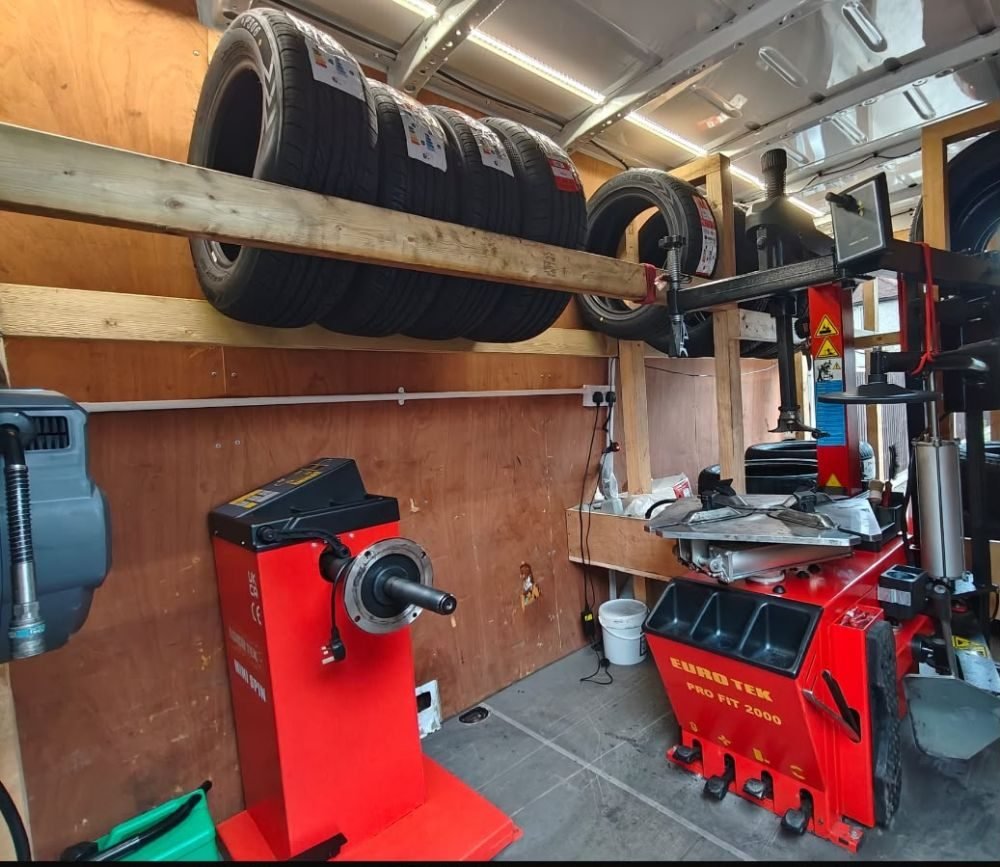 Inside the 711 Breakdown Recovery mobile tyre fitting van — tyre stock and wheel balancing equipment
